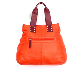 Vogue Crafts and Designs Pvt. Ltd. manufactures Orange Tote Bag at wholesale price.